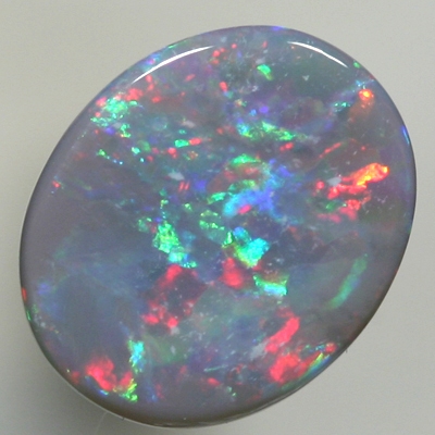 SOLID SEMI BLACK OPAL Red sparkles amongst green